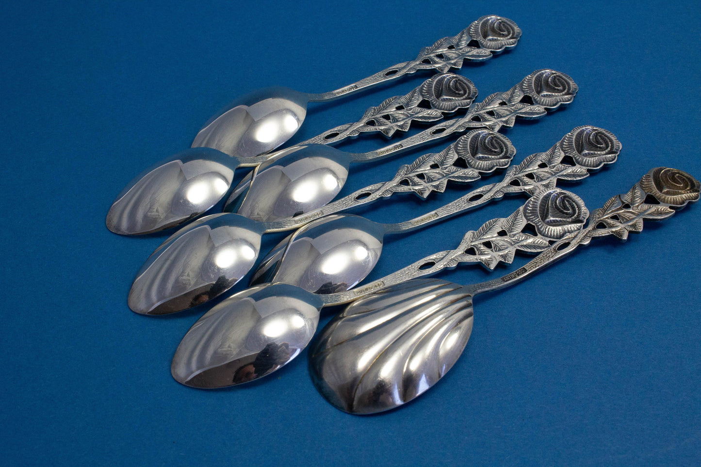 6 small mocha spoons with a matching sugar spoon