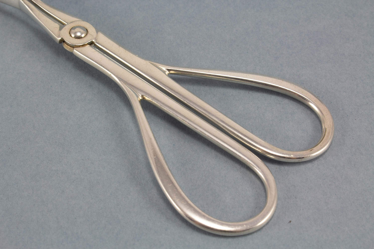 Versilberte Gebäckzange, Vintage