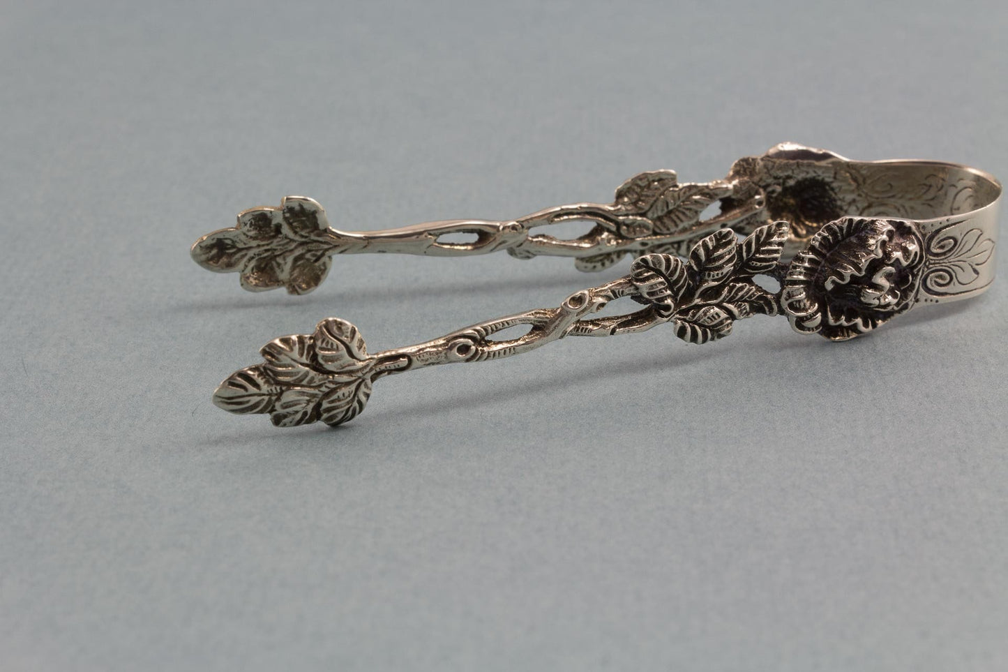 Small rose sugar tongs, 835s, silver