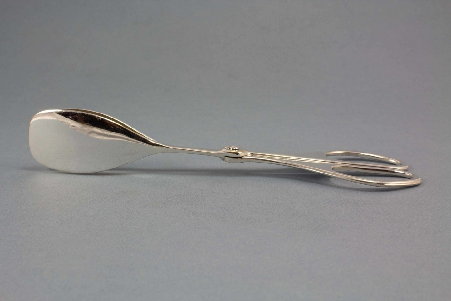 Versilberte Gebäckzange, Art Deco - Löffelland