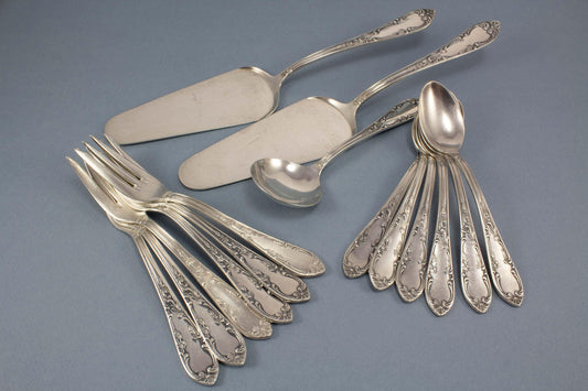 Vintage cutlery set for 6 people in rococo style