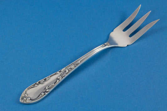 Silver plated bread fork in rococo style