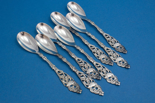 7 seltene Mokkalöffel mit einem Paradiesvogel, versilbert im Jugendstil