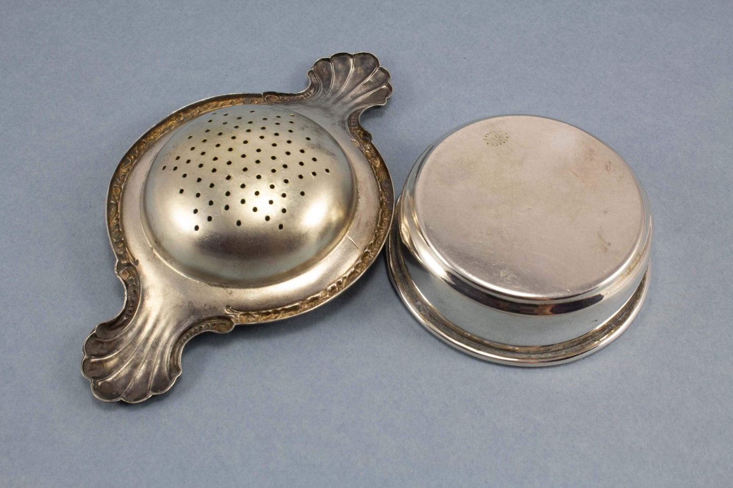 Silver-plated tea strainer with Art Nouveau decorations