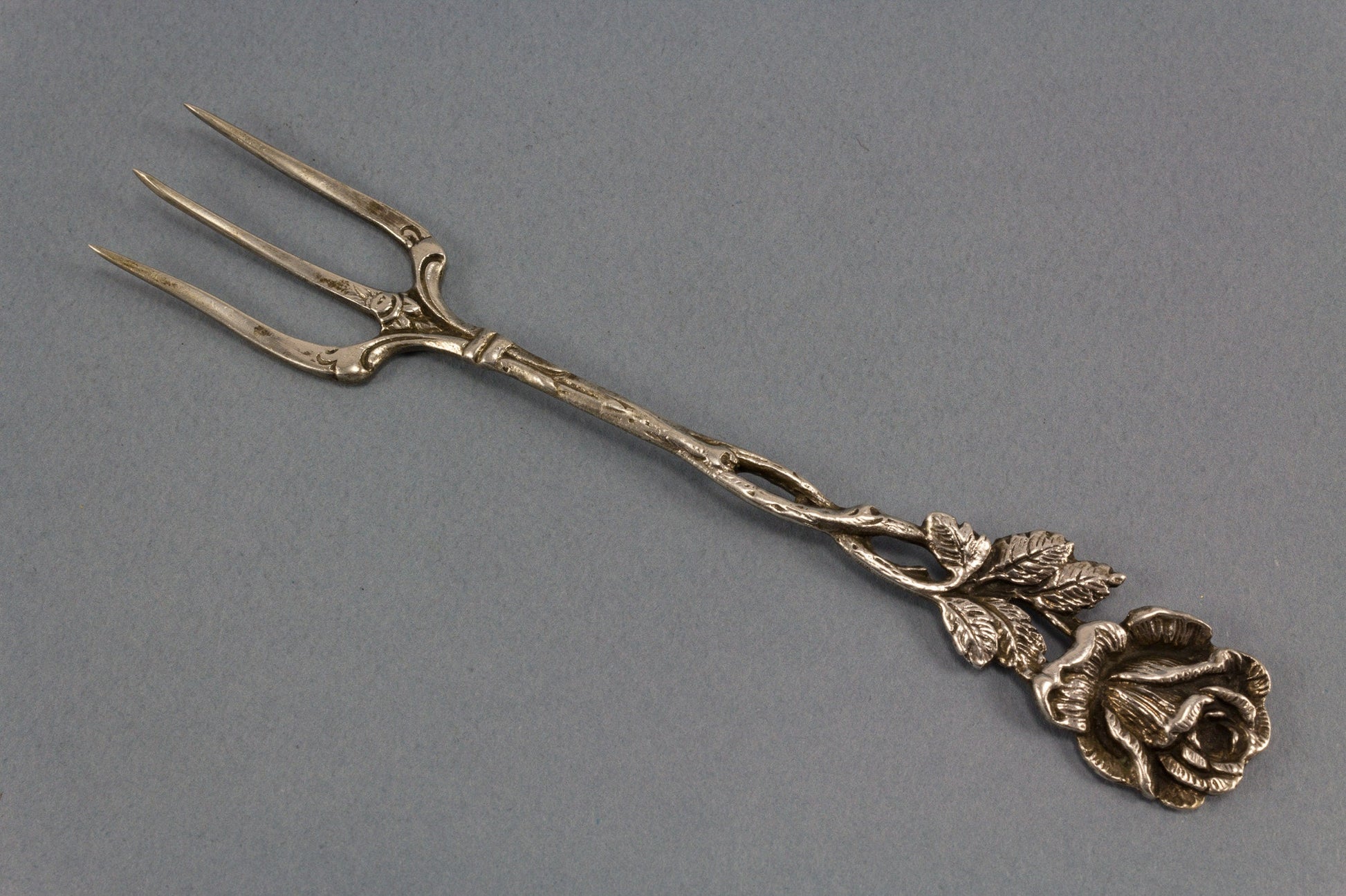 Beautiful fork made of 800 silver with roses for antipasti, bread and chocolates 