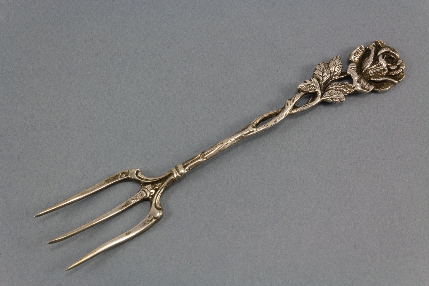 Beautiful fork made of 800 silver with roses for antipasti, bread and chocolates 