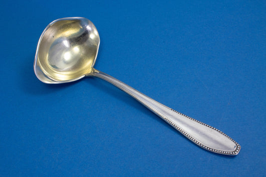 Versilberte Saucenkelle, Perlmuster, versilberte Kelle